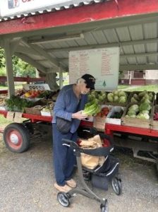 Jack at the farmers market using his Meta glasses.