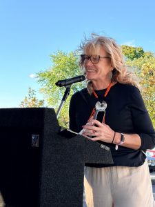 Pam Fields addressing attendees at the Ribbon Cutting Ceremony