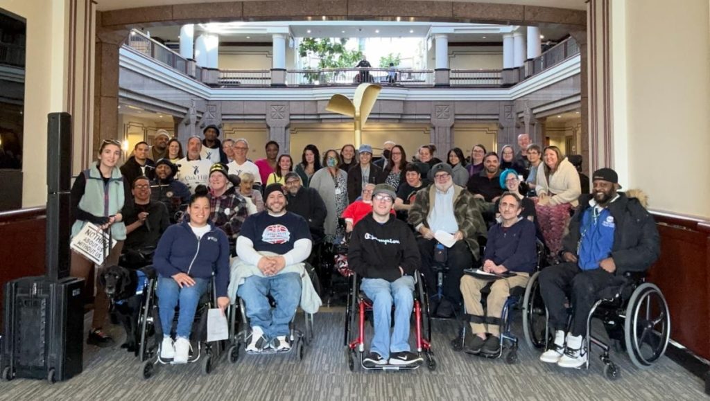 CT wheelchair reform coalition members in the CT Legislature office Building lobby