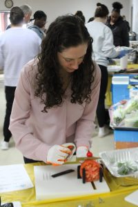 Using a one handed knife during the Hands-on Cooking without Limits Training